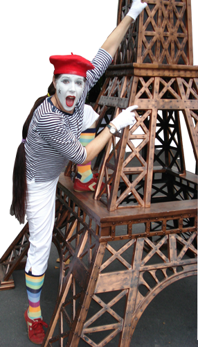 Penny England as a Mime Climbing the Eiffel Tower
